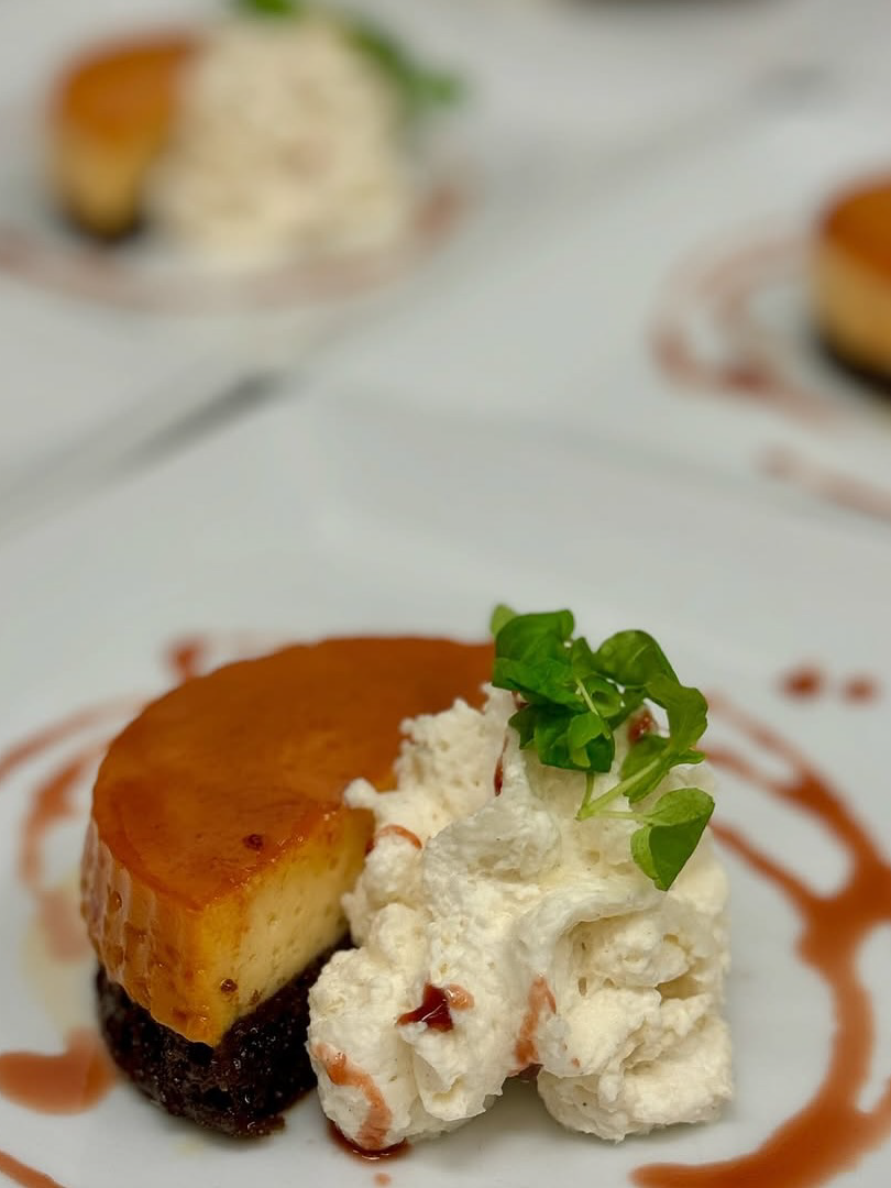 Plated Dessert with Cream and Caramel Sauce prepared as a Jetfinity catering selection