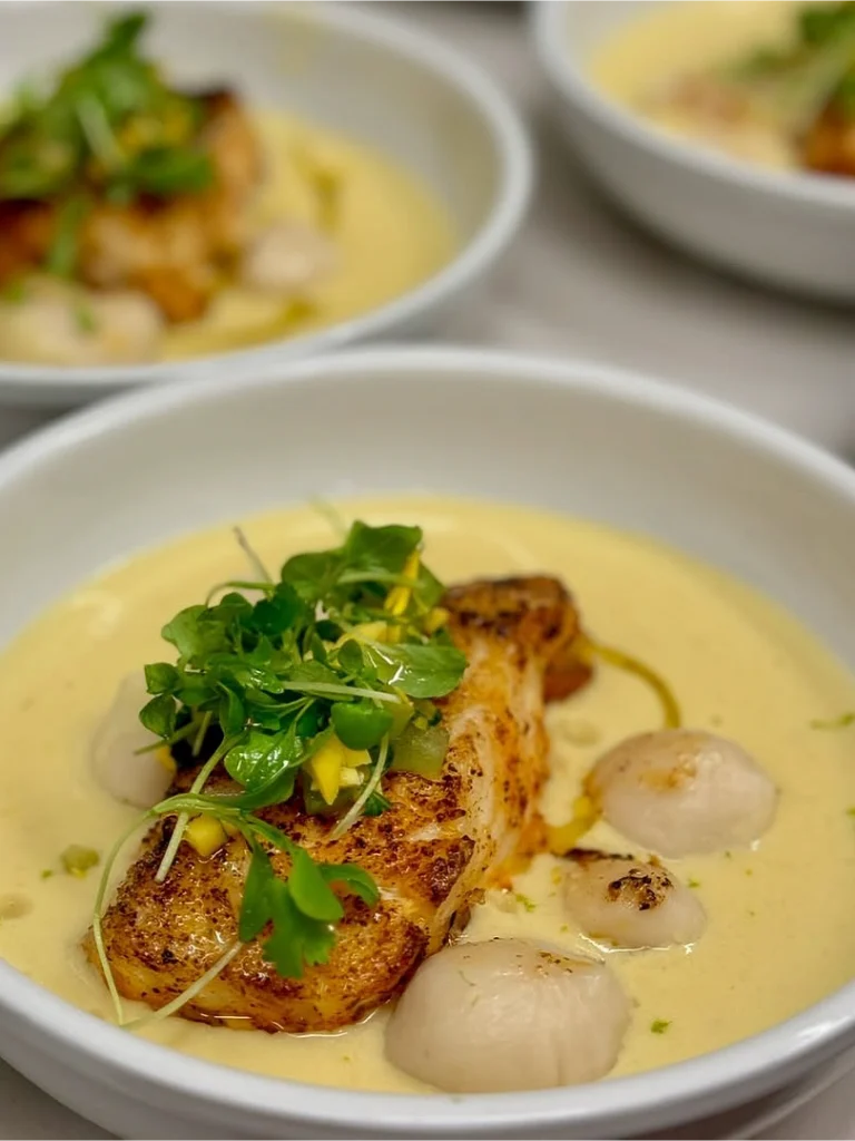 Soup Bowl with Seared Fish and Pearl Onions prepared as a Jetfinity catering selection